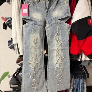 TRUE RELIGION X BELLA DOÑA MID RISE CUT OUT FLARE JEAN